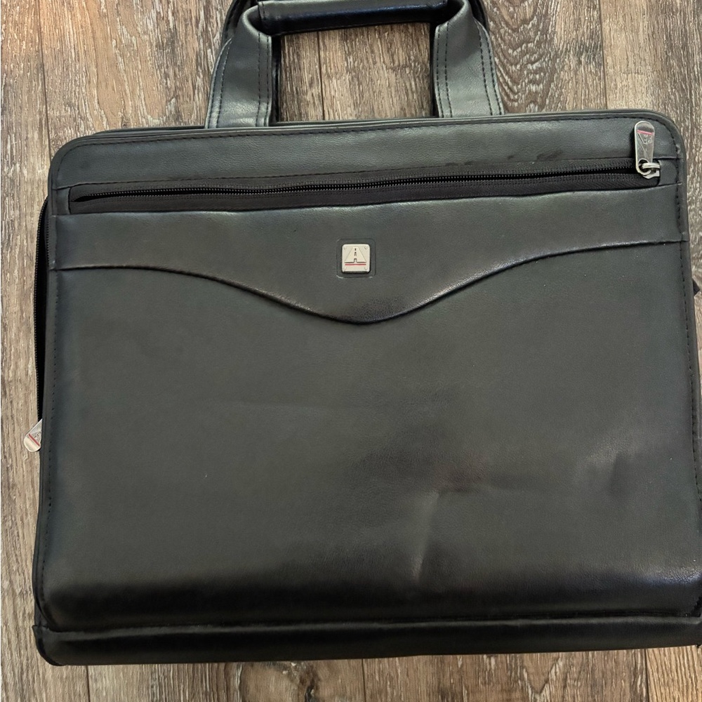 Sleek Black Briefcase with Matte Finish and Sturdy Handle